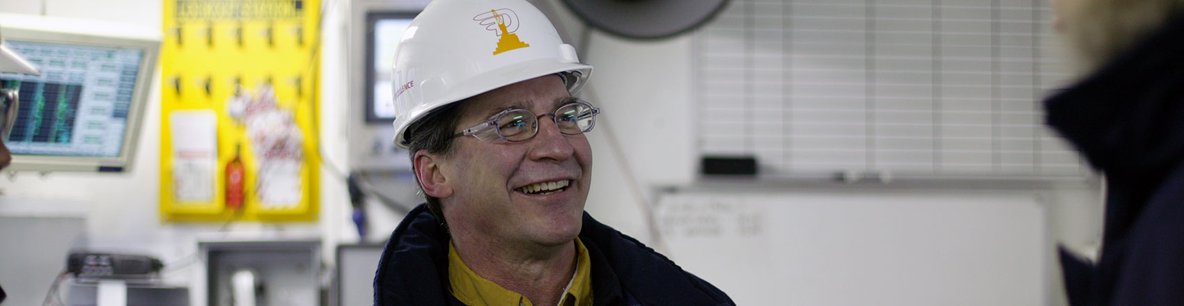 Doyon Drilling general manager hard at work in a rig office.